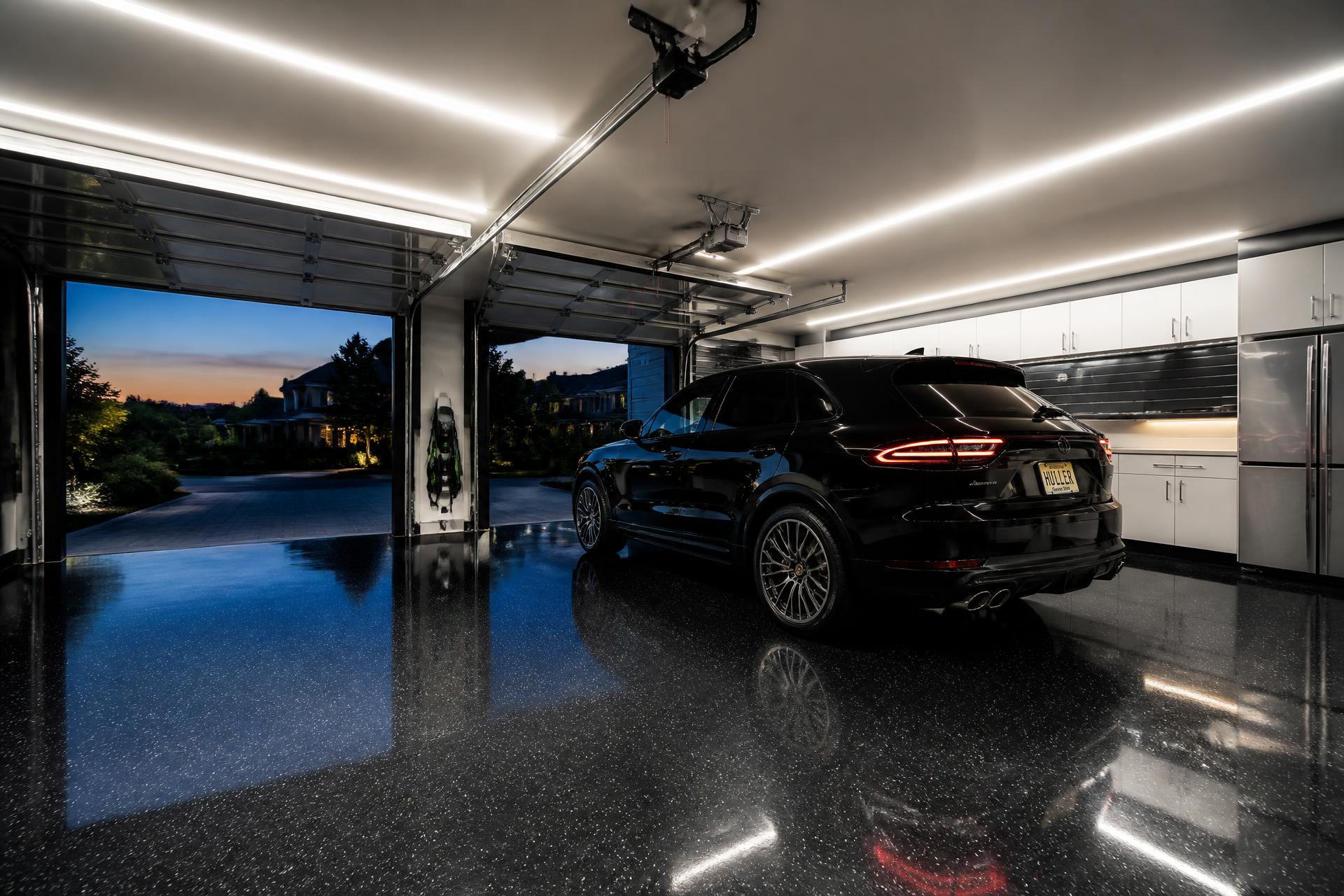 Luxury New Jersey garage with glossy metallic epoxy flooring and a high-end vehicle